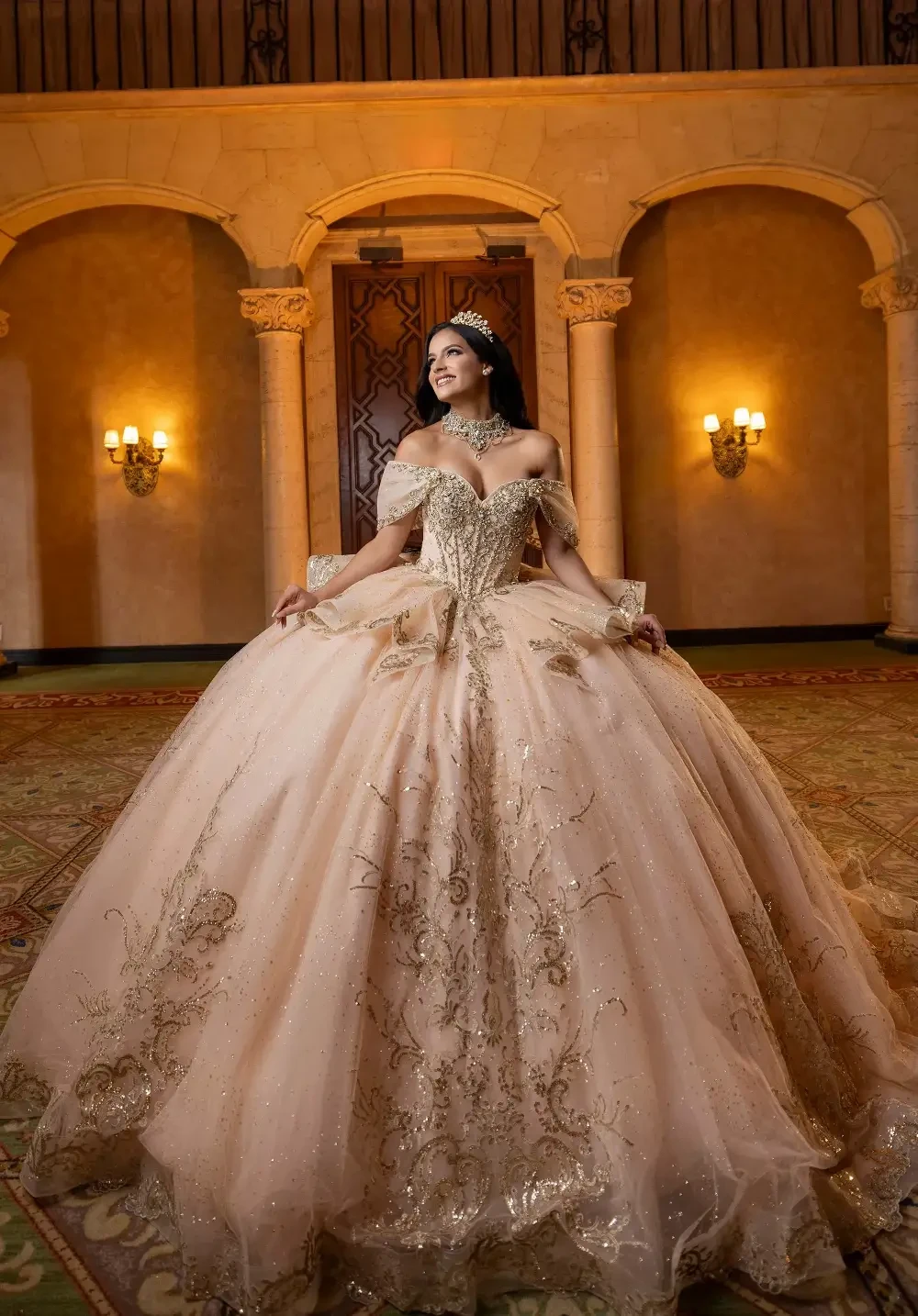 model is wearing a light pink quince gown