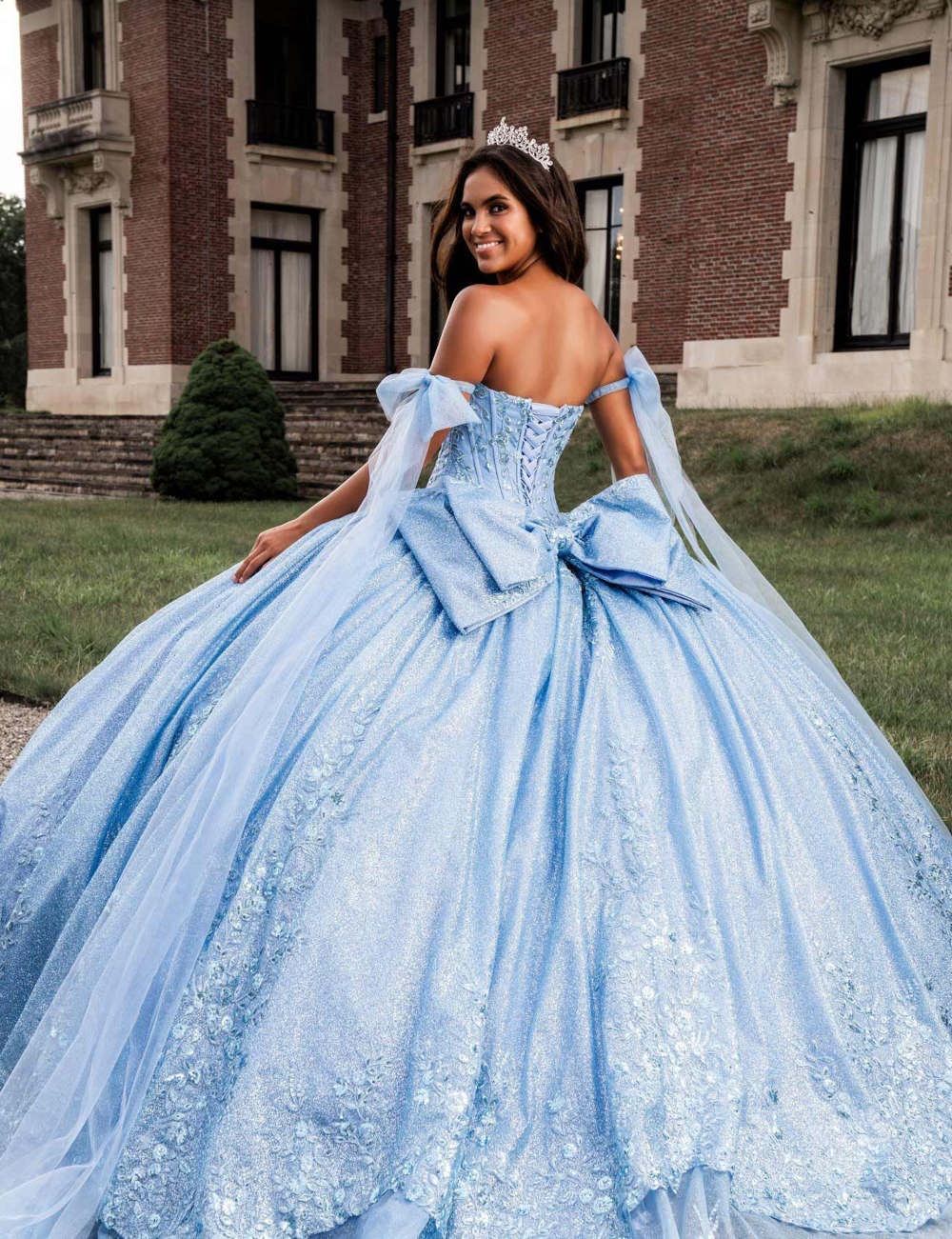 Model wearing a blue gown - Mobile Image