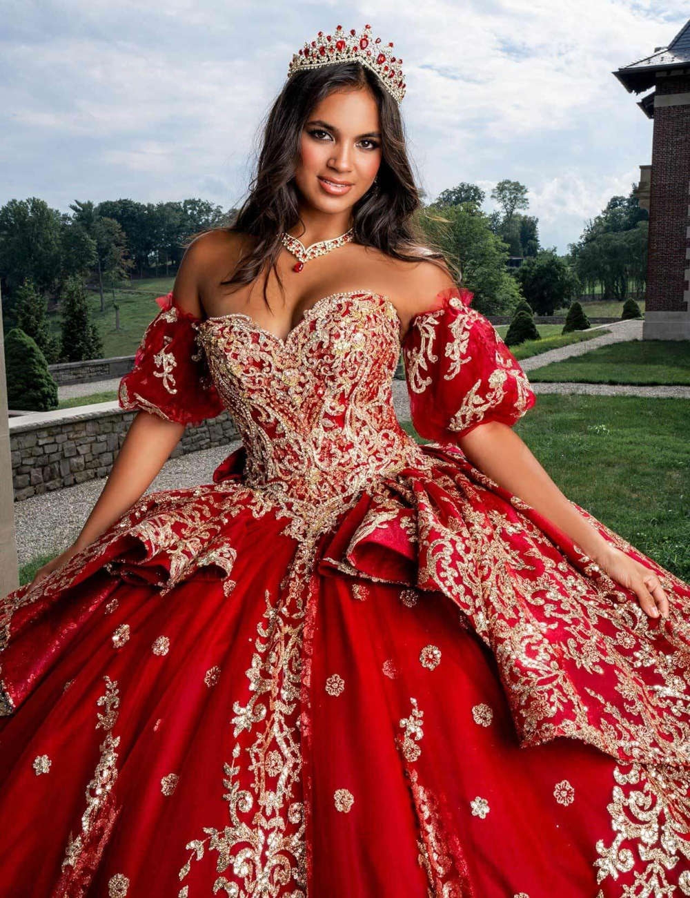 Model wearing a red gown - Mobile Image