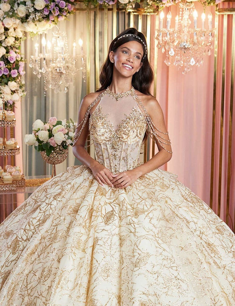 Model wearing a quince light green gown